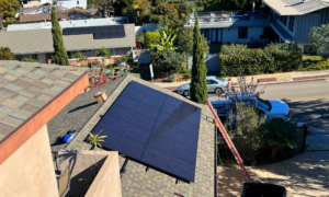 The Mannheimer residence showcasing a new 9.6 kW solar system on their asphalt shingle roof in La Jolla, CA