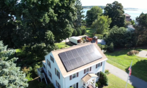 Suncovia solar panel installation on a coastal Maine home, providing clean and sustainable energy.