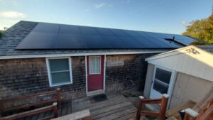 Compact residential home featuring Suncovia-installed solar panels, delivering efficient and sustainable energy solutions.