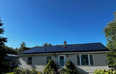 Residential home with rooftop solar panels installed by Suncovia, showcasing sustainable energy solutions for a greener future.