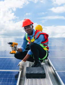 Skilled technician installing solar panels for Suncovia, delivering expert craftsmanship and reliable renewable energy solutions.