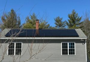 Residential home with rooftop solar panels installed by Suncovia, capturing spring sunlight for energy efficiency and savings.