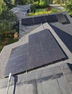 Suncovia team installing solar panels on a roof to maximize Massachusetts solar net metering benefits