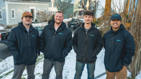 Cumberland County solar company crew installing solar panels on a residential rooftop in Maine
