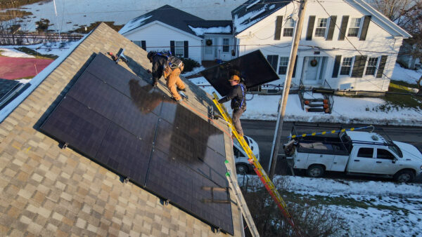 Home with solar panels helping homeowners save as Maine electric rates in 2026 rise