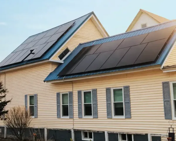 Completed rooftop solar installation by Suncovia, a New Hampshire solar company, on a residential home.