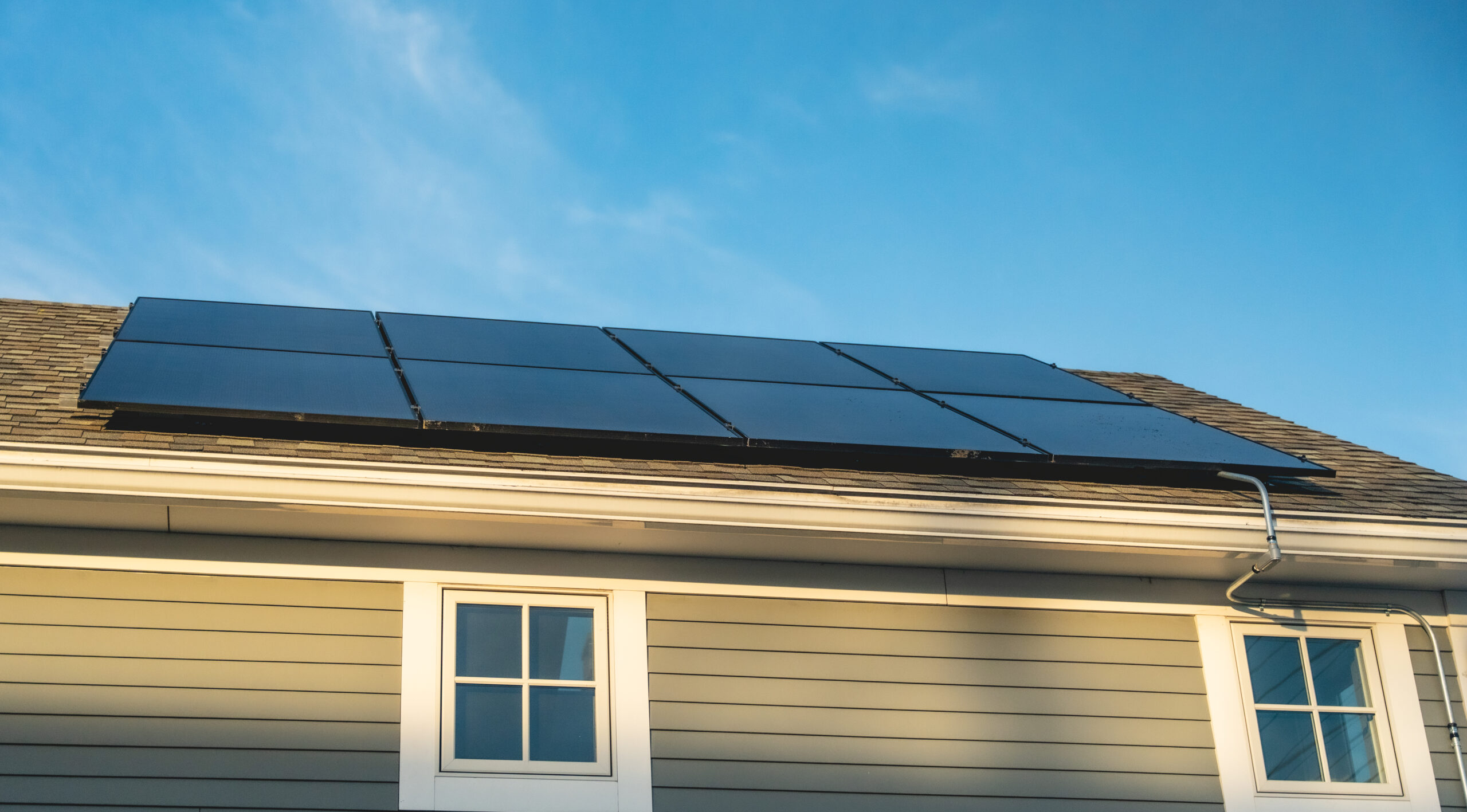 brown shingles roof solar panels Suncovia project Wiscasset